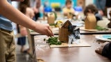 Student designing structure during ArchWeek25