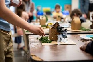 Student designing structure during ArchWeek25