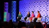 Natasha Engan, senior VP of global sales at Deltek, moderates a panel discussion including Gia Biagi, principal of urbanism and civic impact at Studio Gang; Ciere Boatright, commissioner of Chicago Department of Planning and Development; AIA 2024 president Kimberly Dowdell