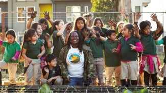 Kids with teacher at public garden