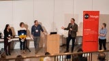 Presenter speaking to panel