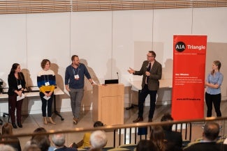 Presenter speaking to panel
