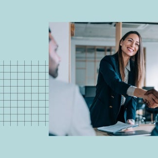 Job candidate shaking hands with hiring managers
