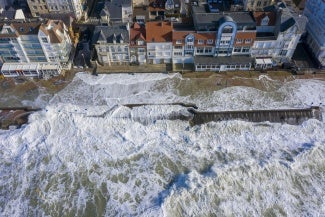 high tide over dike in calais france