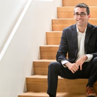 Waldo sitting on wooden stairs