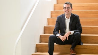 Waldo sitting on wooden stairs