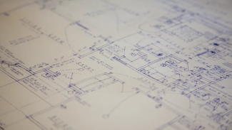 Closeup photo of blueprints