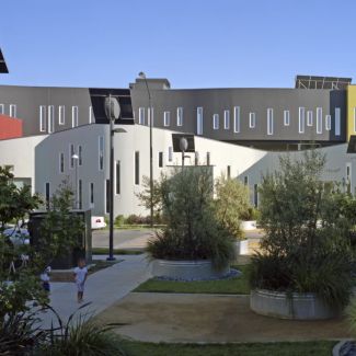 Colorful building that consists of yellow, grey and red